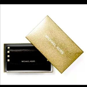 MK trifold black studded leather NWT & gift box.